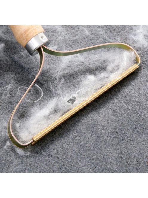 Szösz eltávolító kefe ruhák és bútorok tisztításához