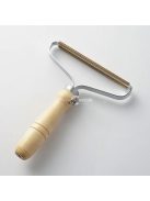 Szösz eltávolító kefe ruhák és bútorok tisztításához