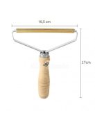 Szösz eltávolító kefe ruhák és bútorok tisztításához