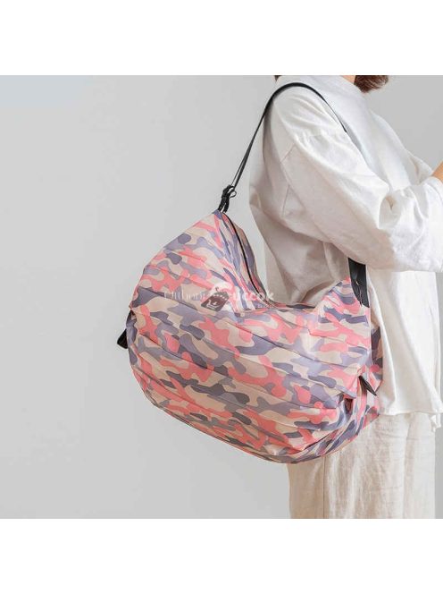 Összehajtható kék utazótáska kompakt tároláshoz