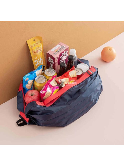 Összehajtható kék utazótáska kompakt tároláshoz