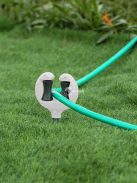 Tömlő irányító és pozicionáló tüske