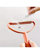 Kétoldalas szösz és szőreltávolító kézi kefe